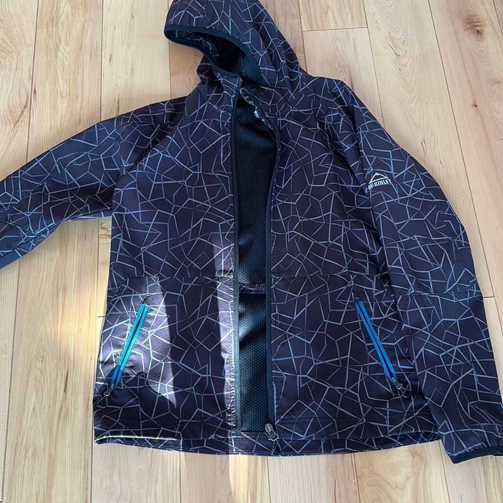 McKinley boys fall light jacket waterproof. Size large.